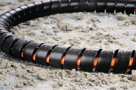 Tykkvegget spiralslange for hydraulikkslanger i anleggsmaskiner