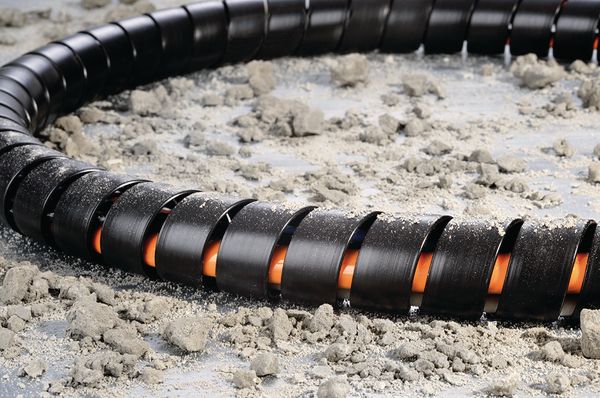Tykkvegget spiralslange for hydraulikkslanger i anleggsmaskiner
